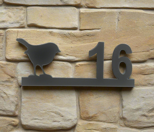 house number plate with robin