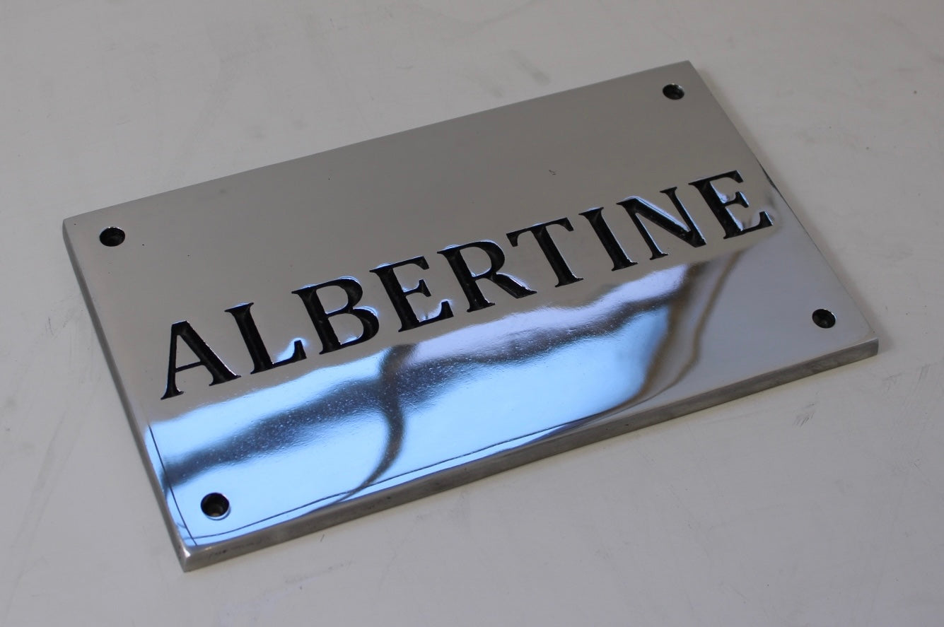 Polished aluminium name sign