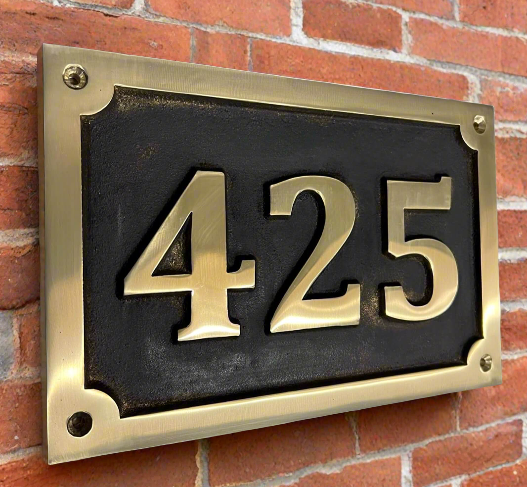 Bronze house number sign