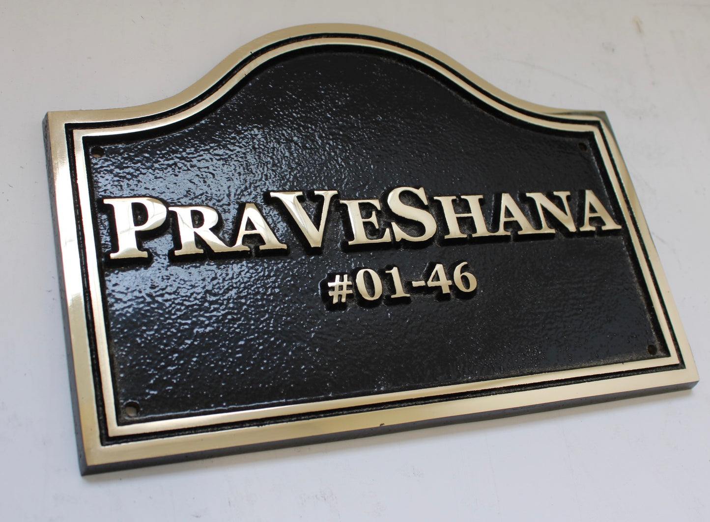 Bronze cast house sign with double border