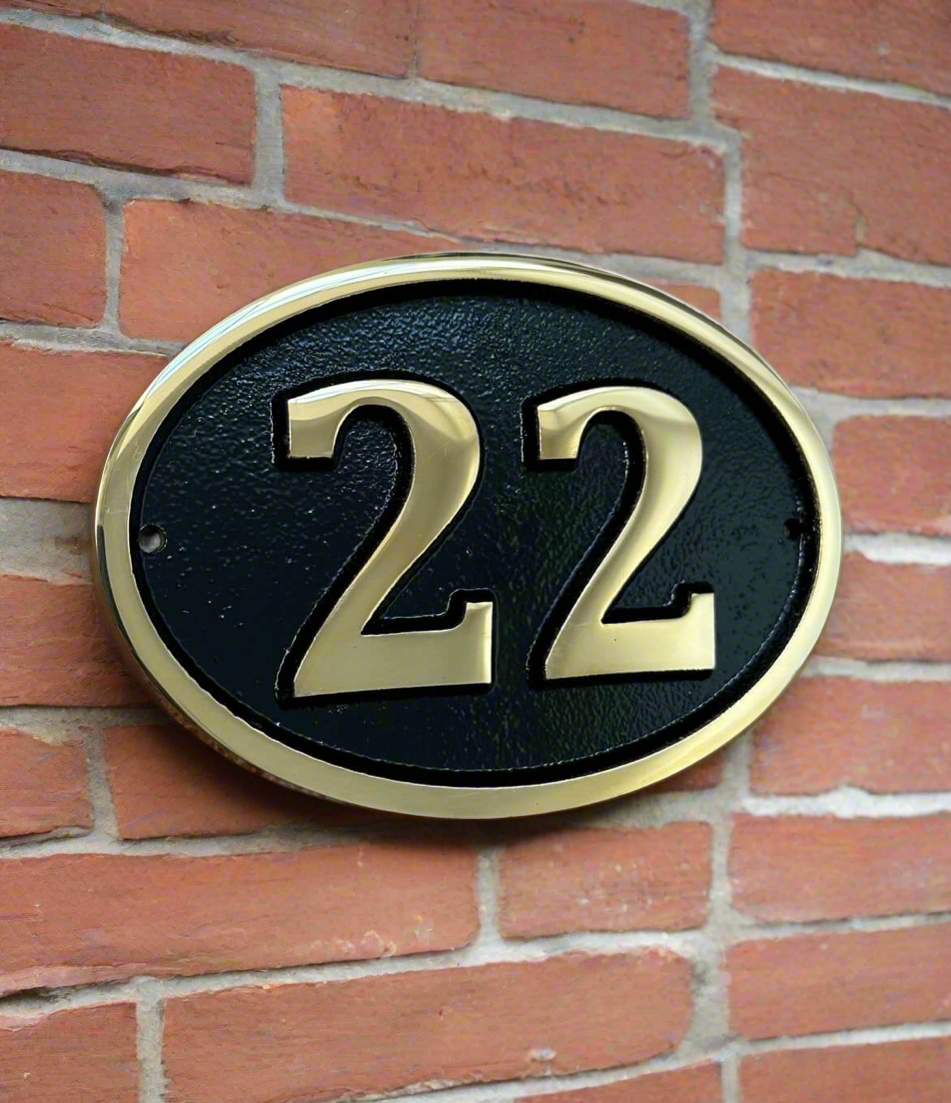 Bronze house number sign