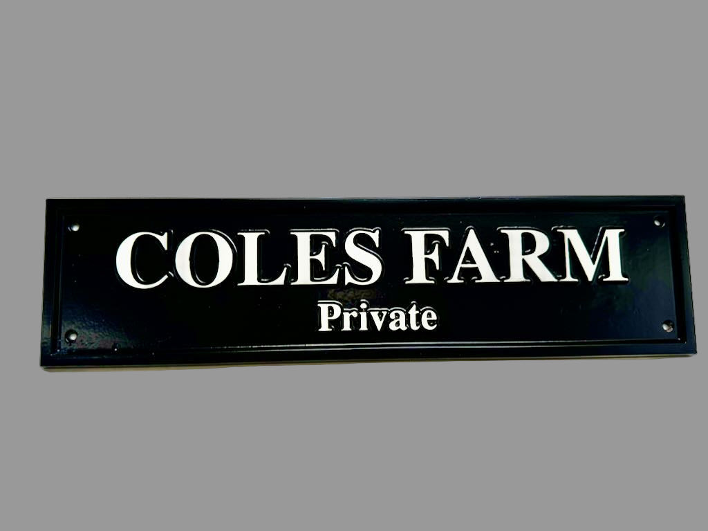 Black and white cast plaque