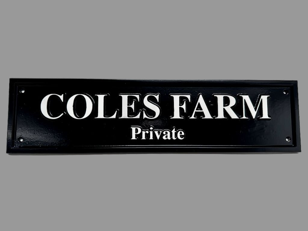 Black and white cast plaque