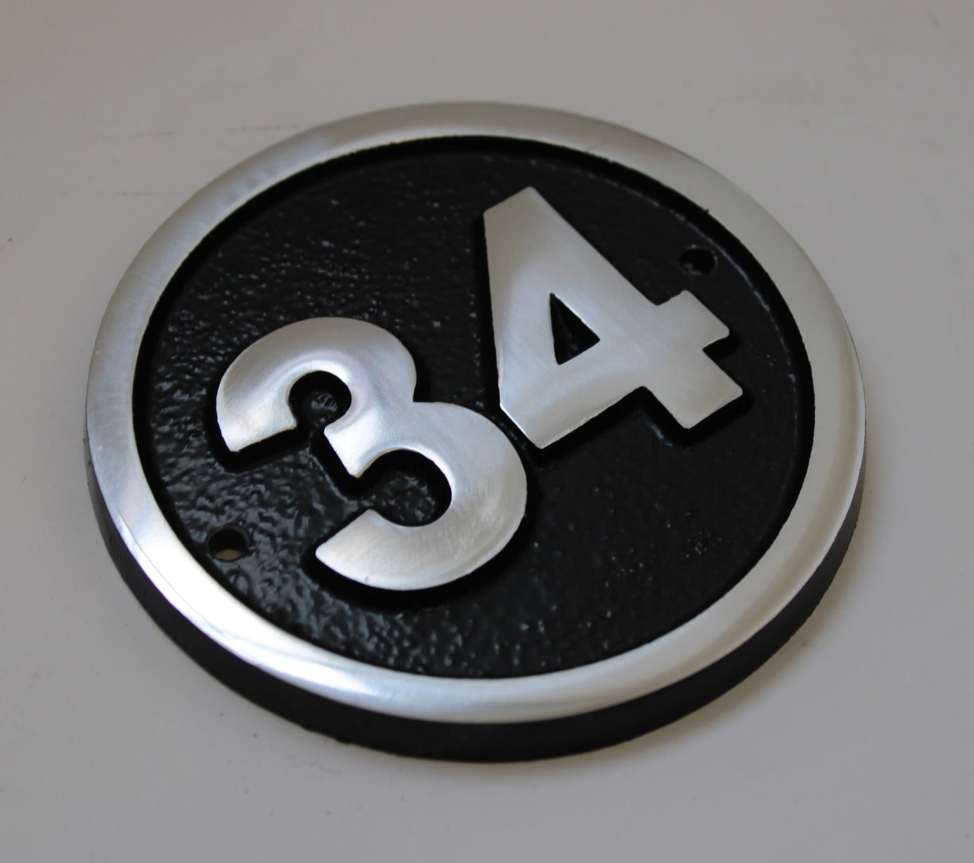 House number sign circle