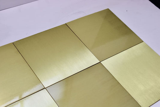 Brushed brass tile