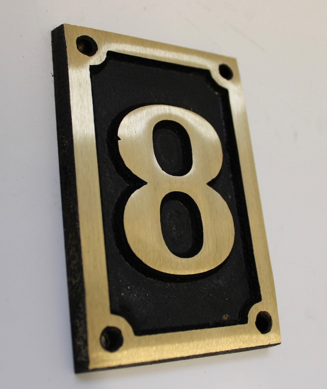 Number sign in bronze