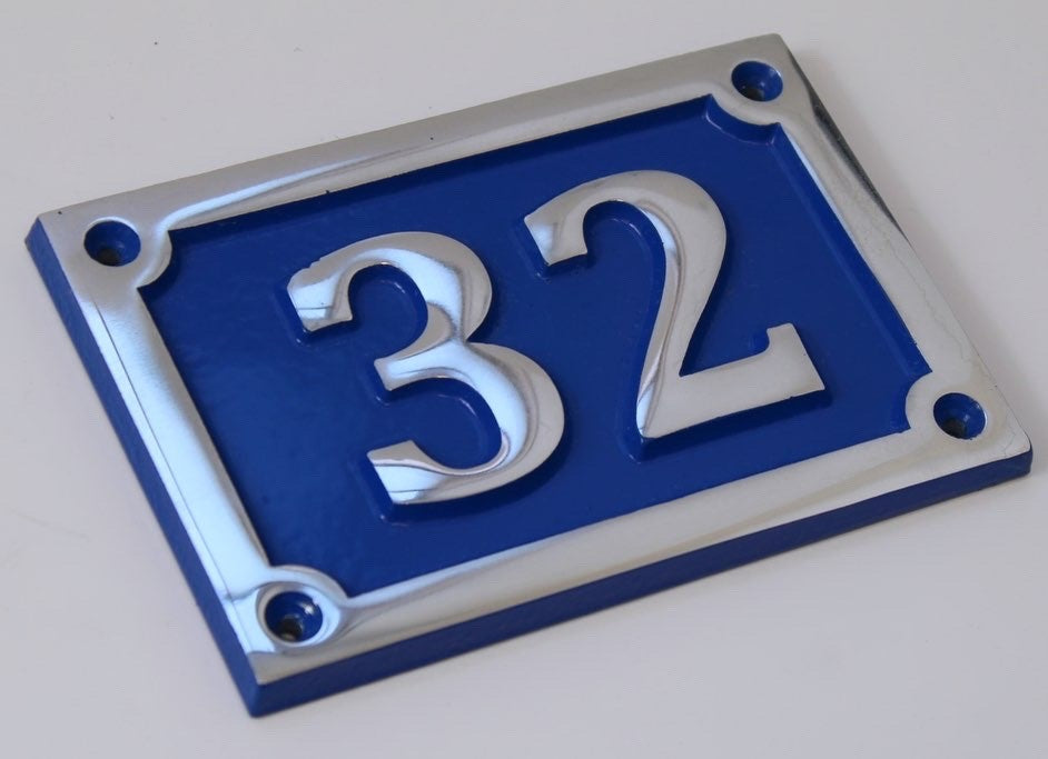 house number sign in aluminium with blue background