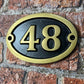 Aluminium number sign with gold painted number and text