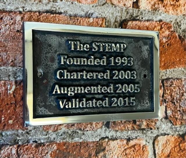 Custom Signs in Aluminium Patina Background