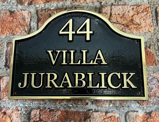 Brass House address Sign