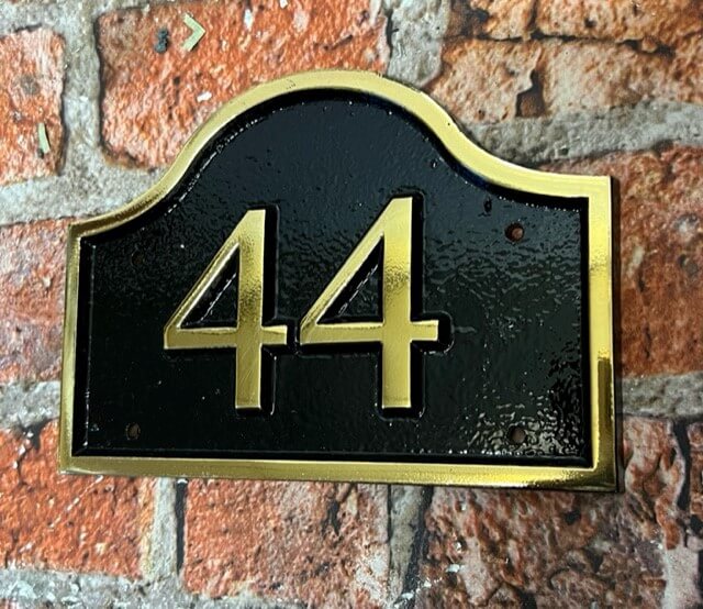 brass house plaque with number