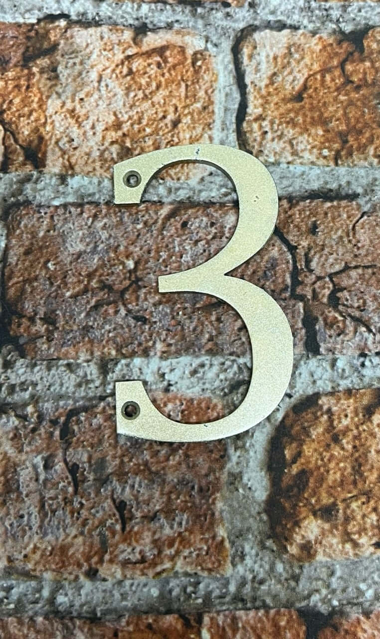 Door numbers in gold