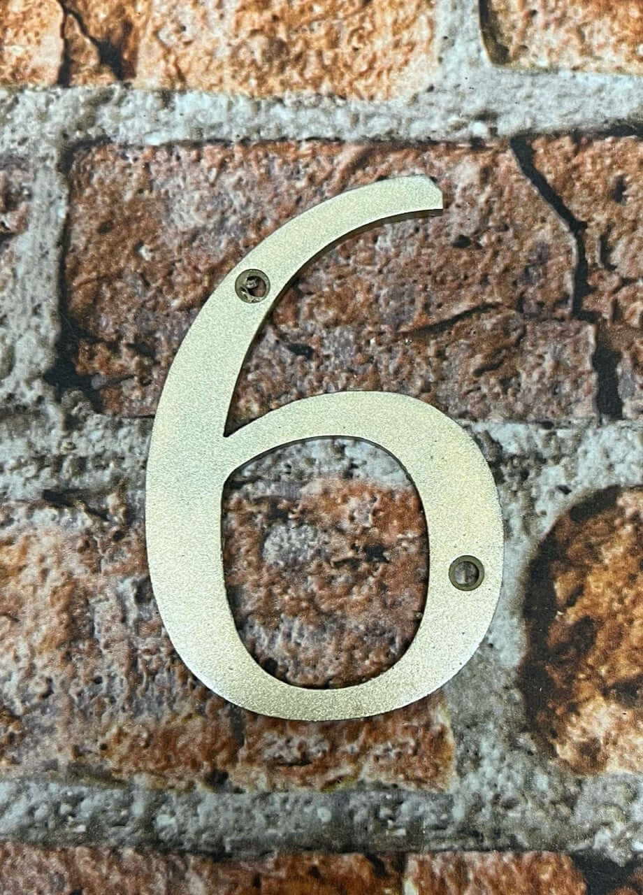 Door numbers in gold