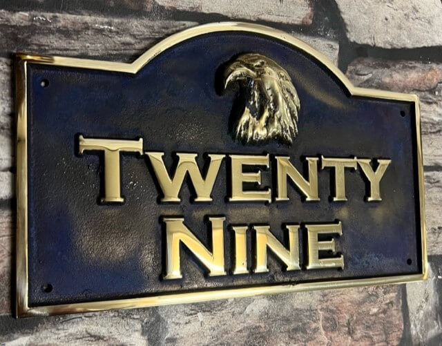 house Address sign curved top in blue