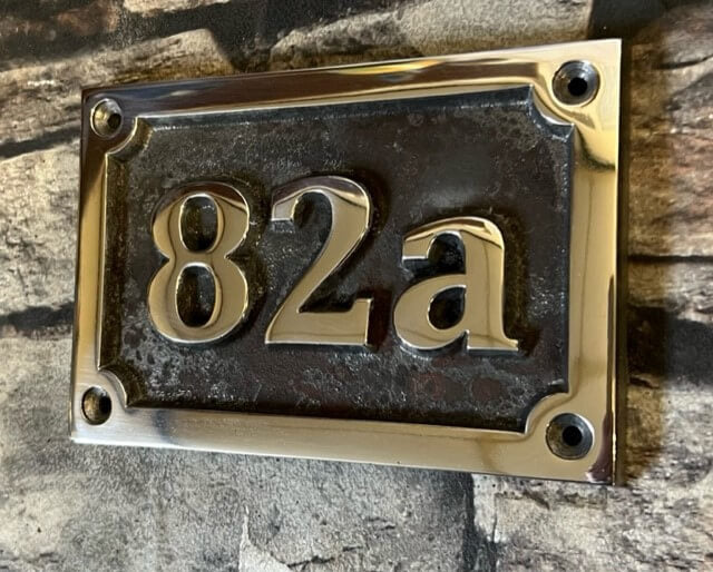 house number sign rectangle patina background