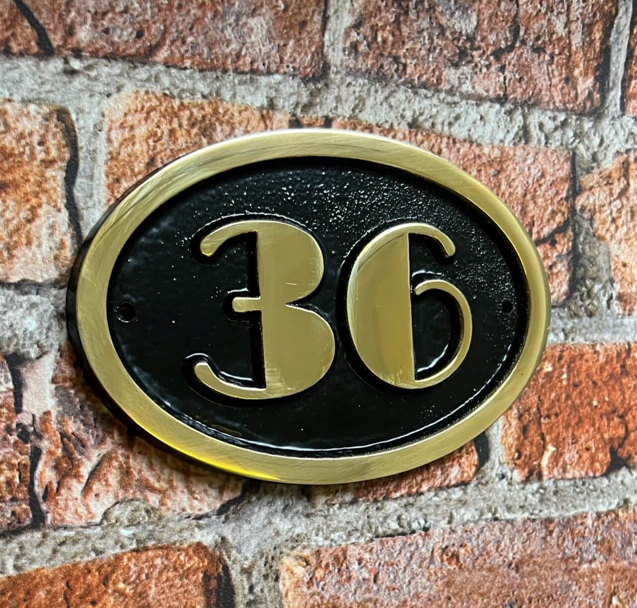 house number sign art deco black background
