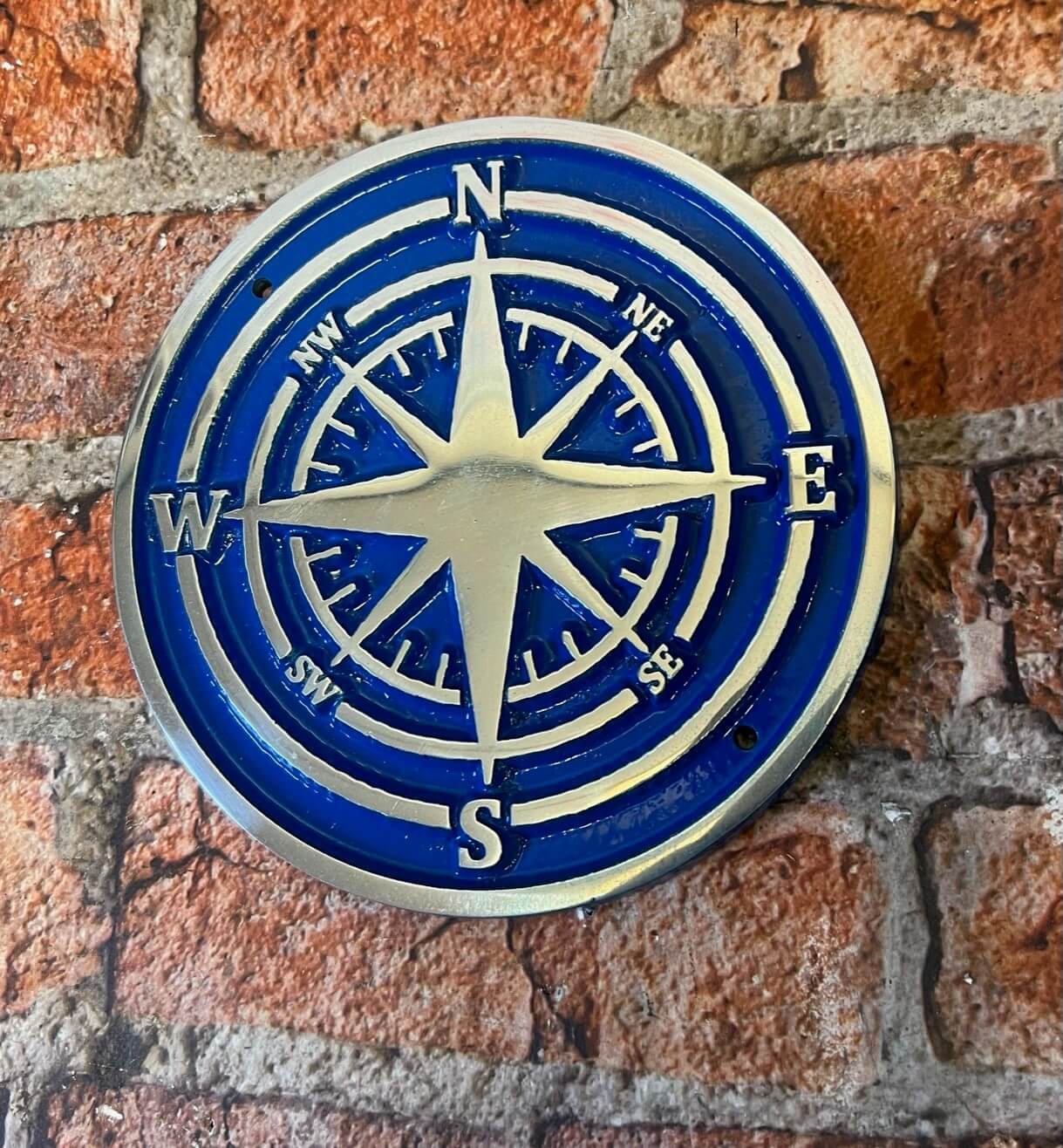 garden compass in blue background