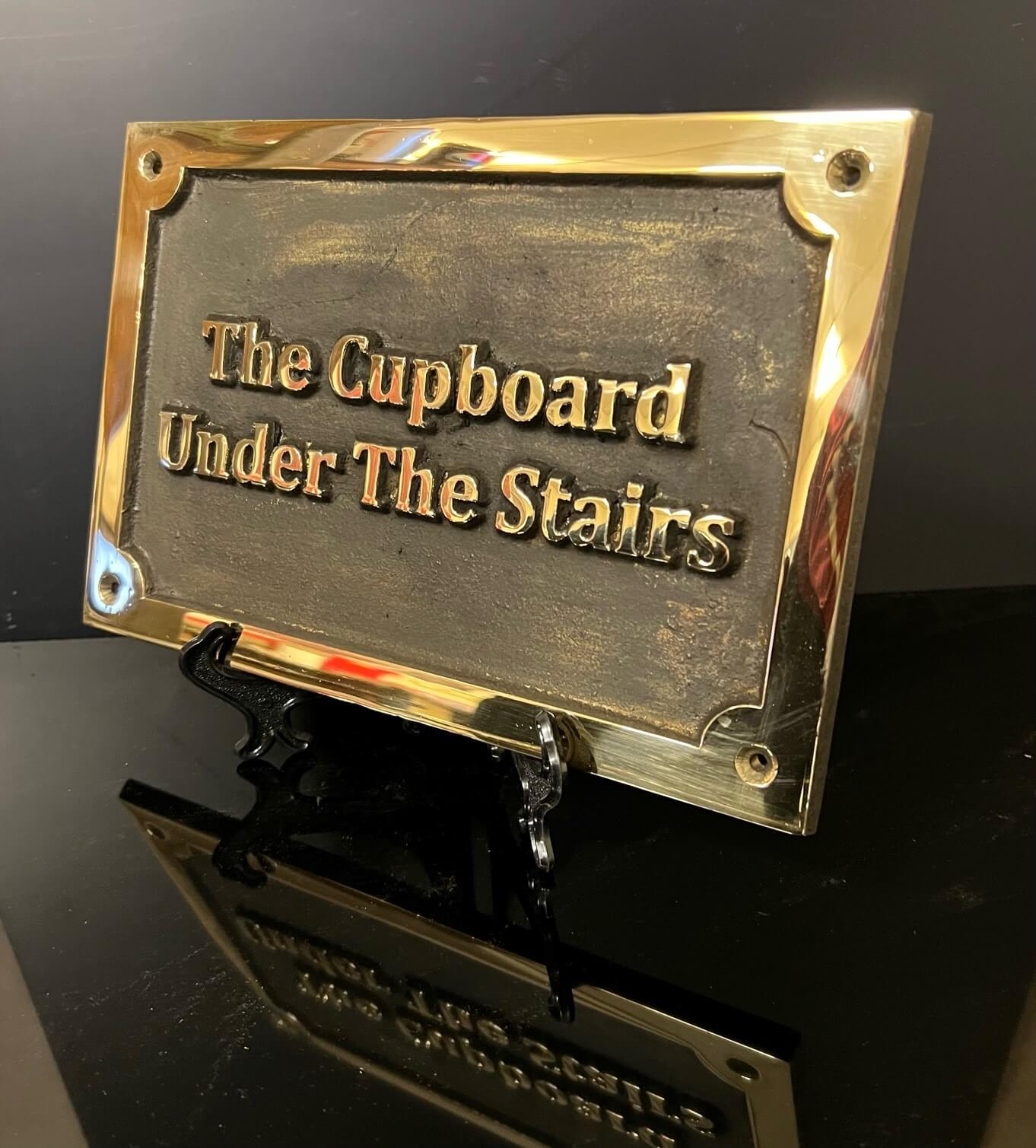 room name signs for hotels in bronze