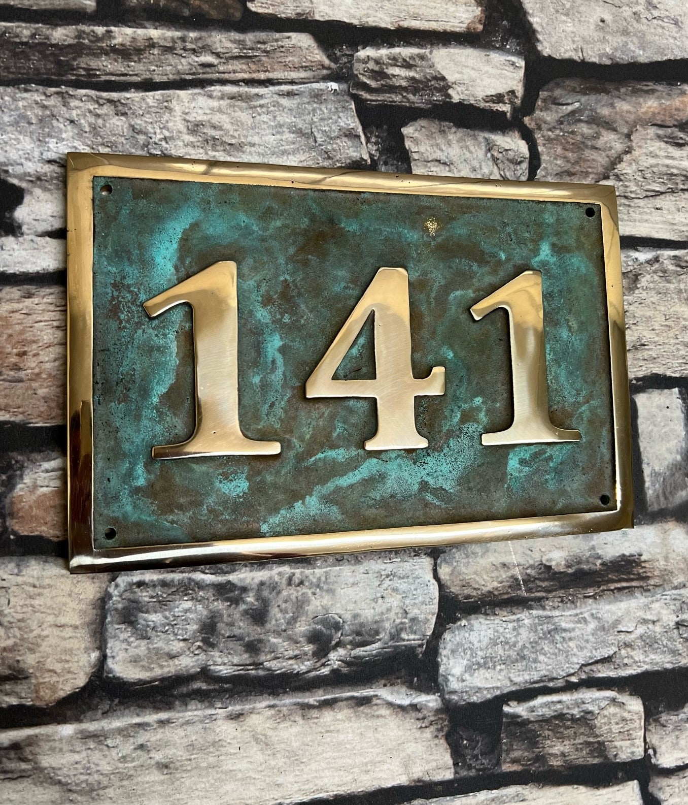 House number sign in bronze and Verdigris