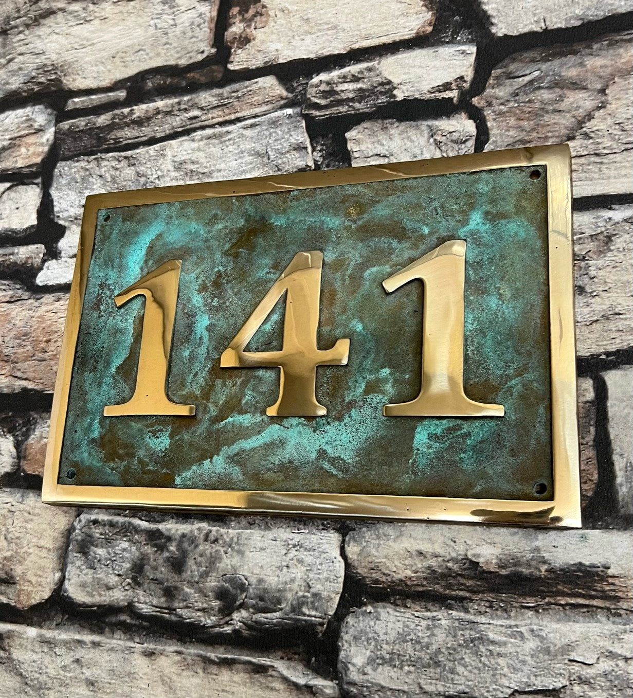 House number sign in bronze and Verdigris
