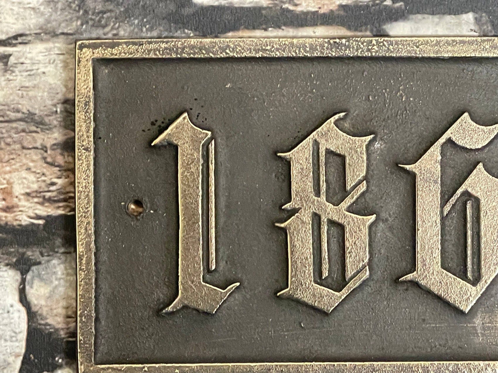 Traditional house sign old English font