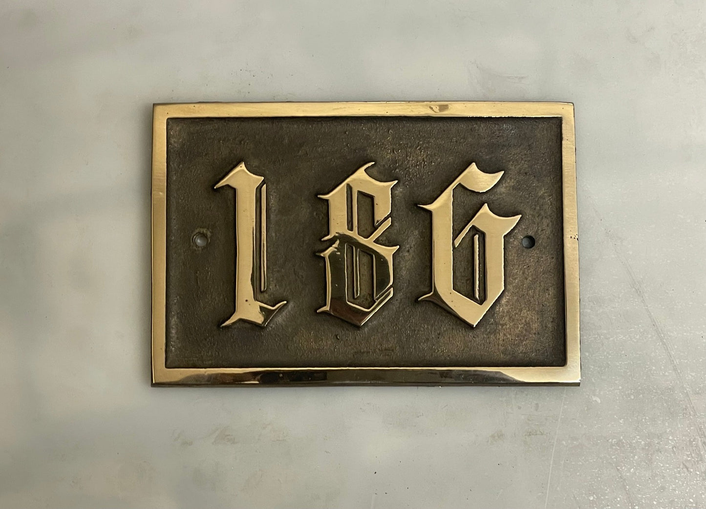 Traditional house sign old English font