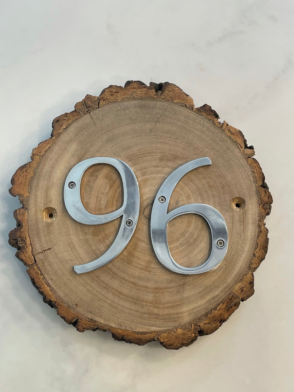 Metal House Numbers on Wood Log