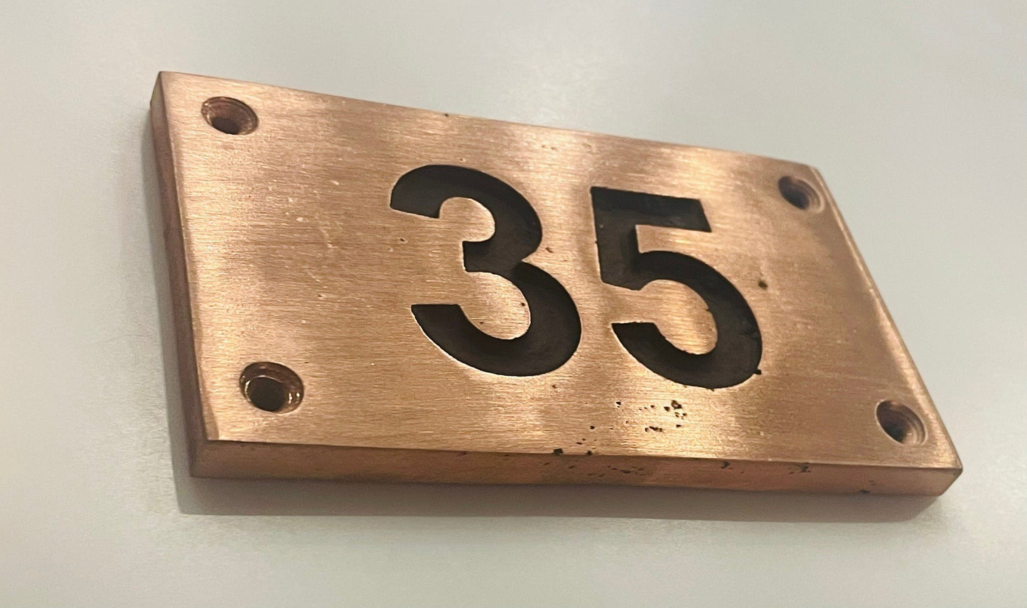 house number signs in copper