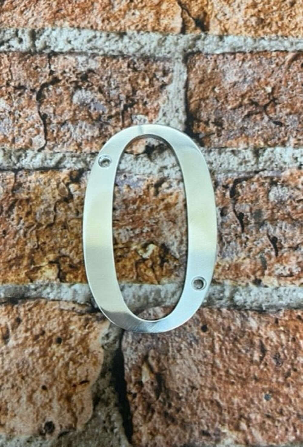 Metal House number 0 polished