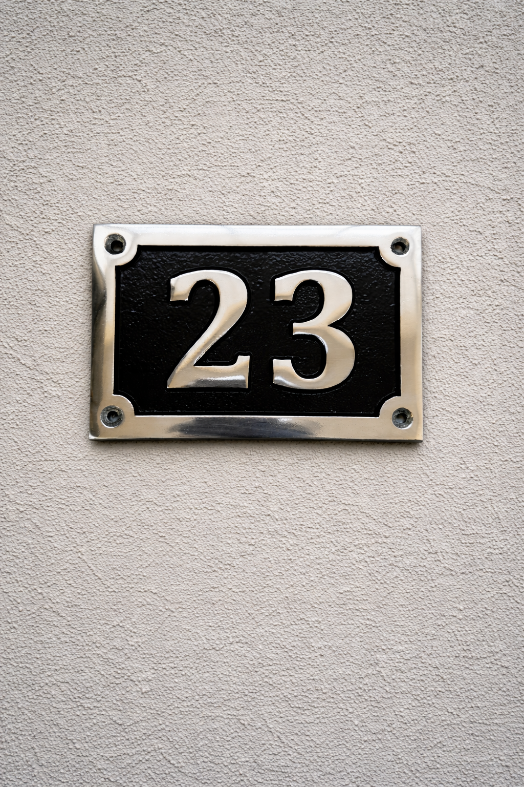 Cast aluminium rectangle house number sign with polished raised numbers and decorative border