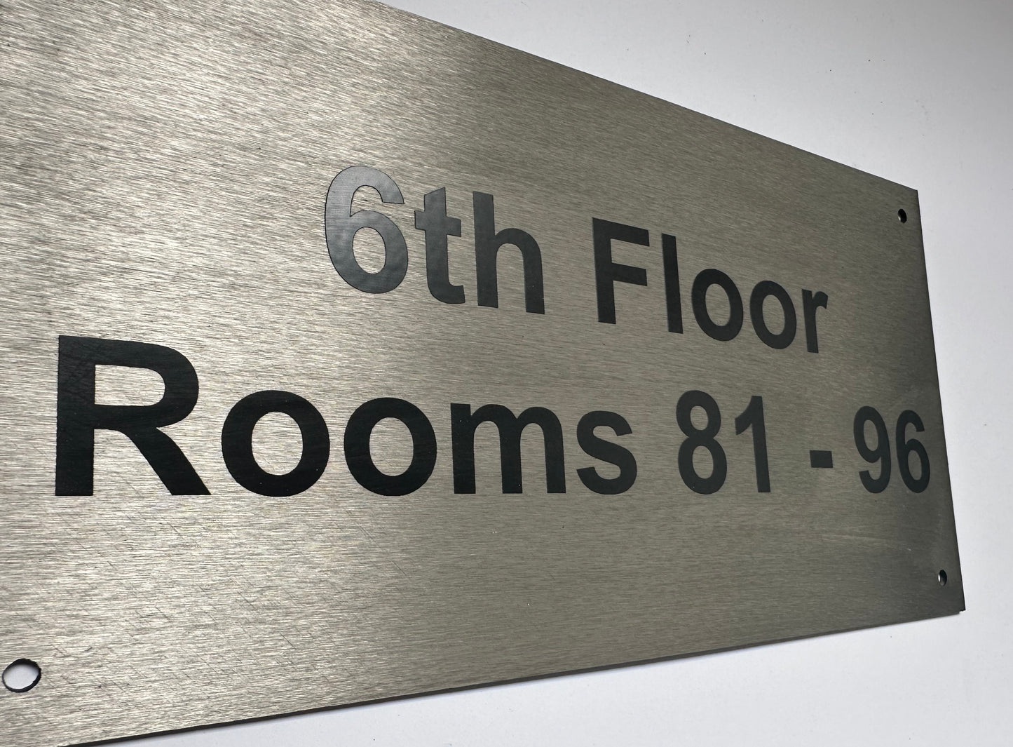 brushed steel sign