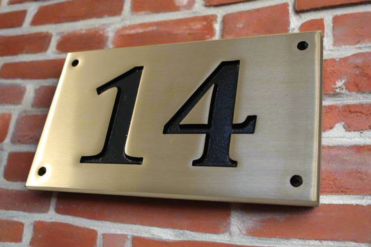 Brushed brass number plate