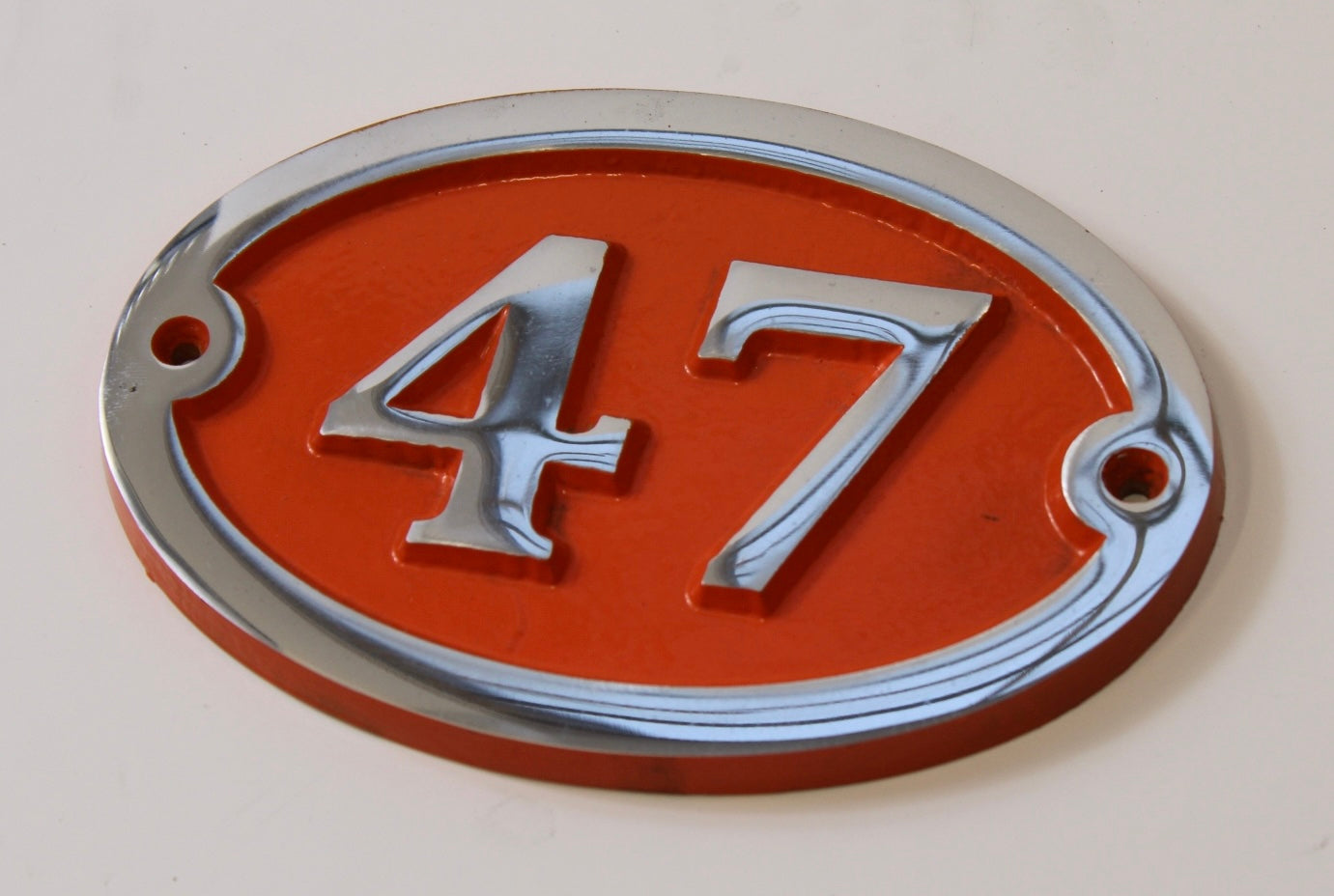 house number sign aluminium with orange background