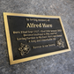 Cast bronze rectangle memorial plaque with satin finish, raised lettering and floral detail