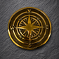 Cast bronze compass wall plaque with raised compass rose detail mounted on exterior wall