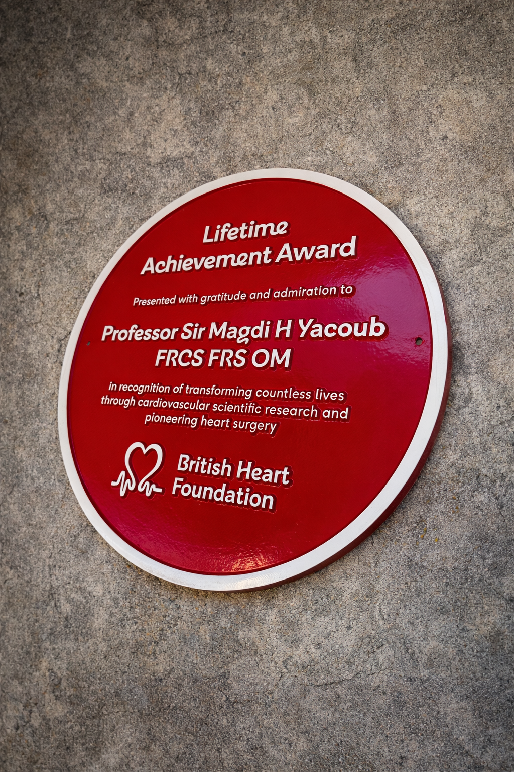 Red heritage plaque - commemorative wall sign