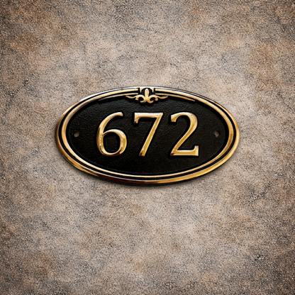 bronze oval hotel room number sign fleur de lis