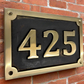 Bronze house number sign 