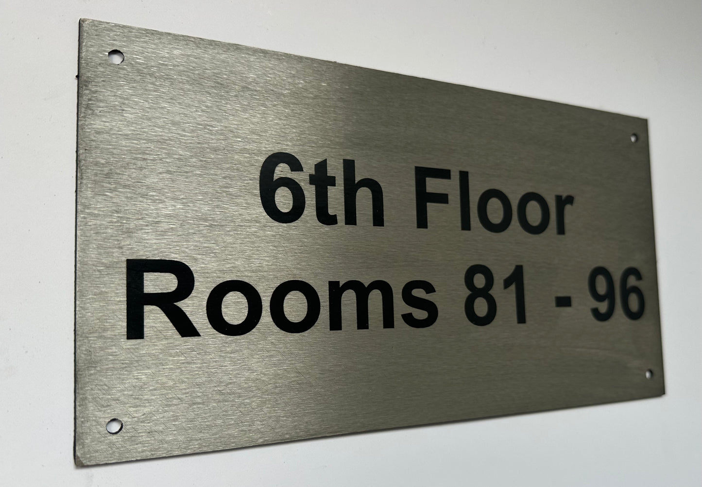 brushed steel sign