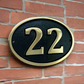 Bronze house number sign 