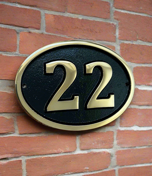 Bronze house number sign 