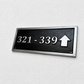 Cast aluminium directional sign with custom text and arrow for hotel or office wayfinding