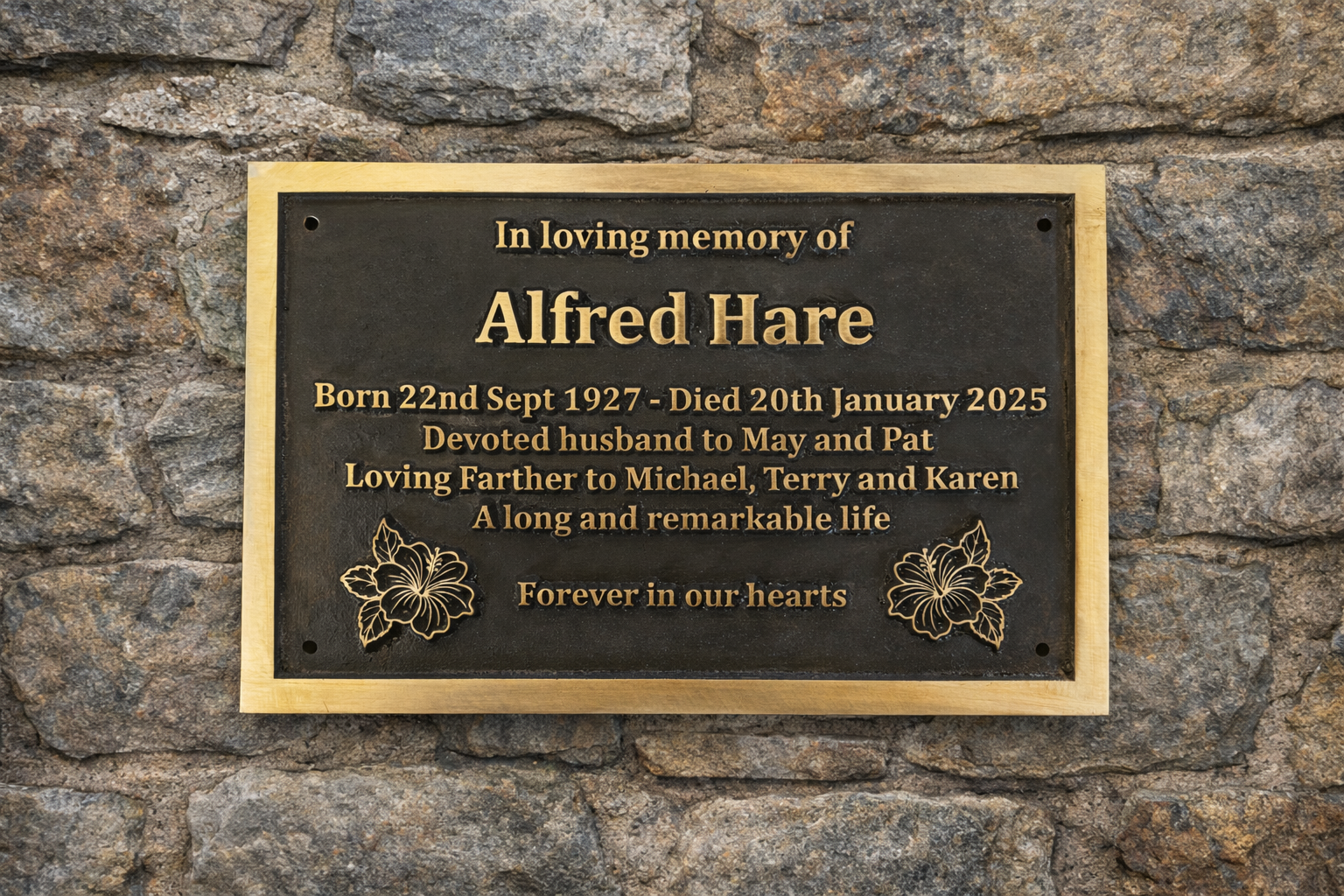 Cast bronze rectangle memorial plaque with satin finish, raised lettering and floral detail