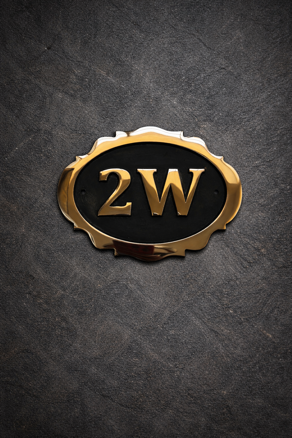 Cast bronze oval house number sign with decorative edge and raised lettering 