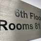 brushed steel sign