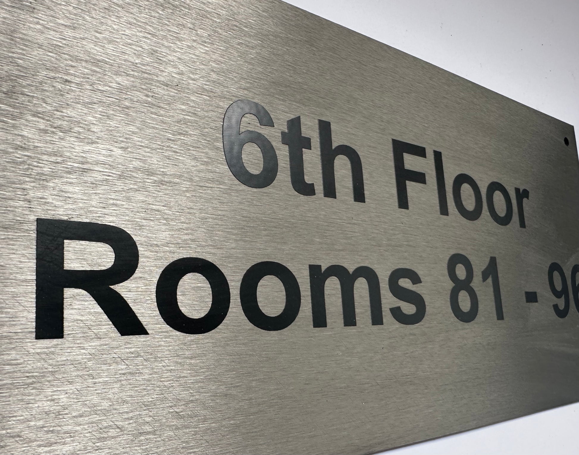 brushed steel sign