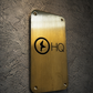 Custom brass business sign with engraved company logo mounted on wall