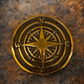 Cast bronze compass wall plaque with raised compass rose detail mounted on exterior wall