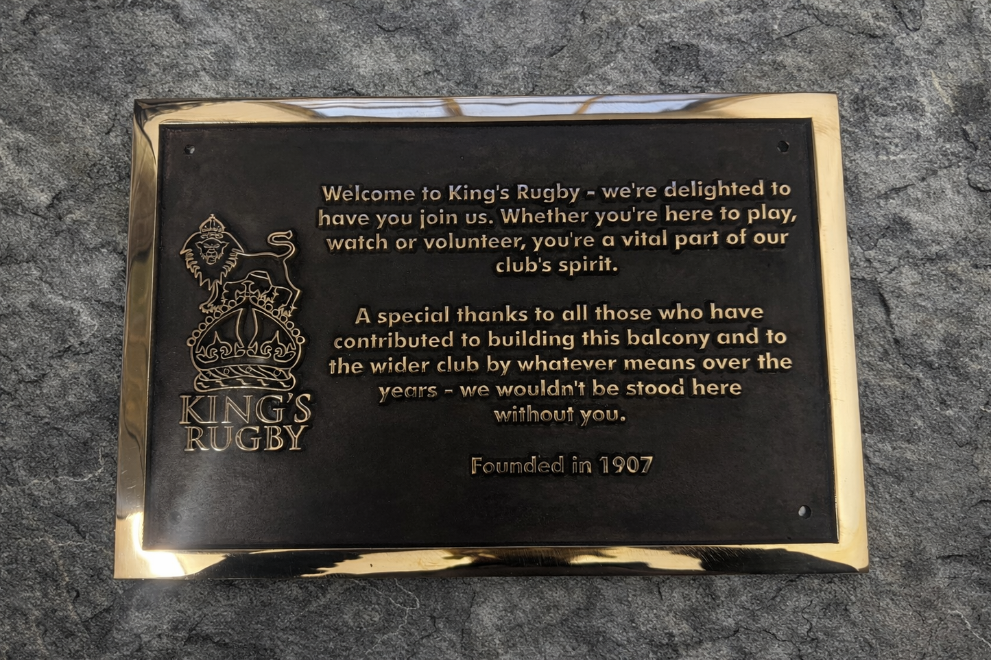 Cast bronze rectangle memorial plaque with polished finish