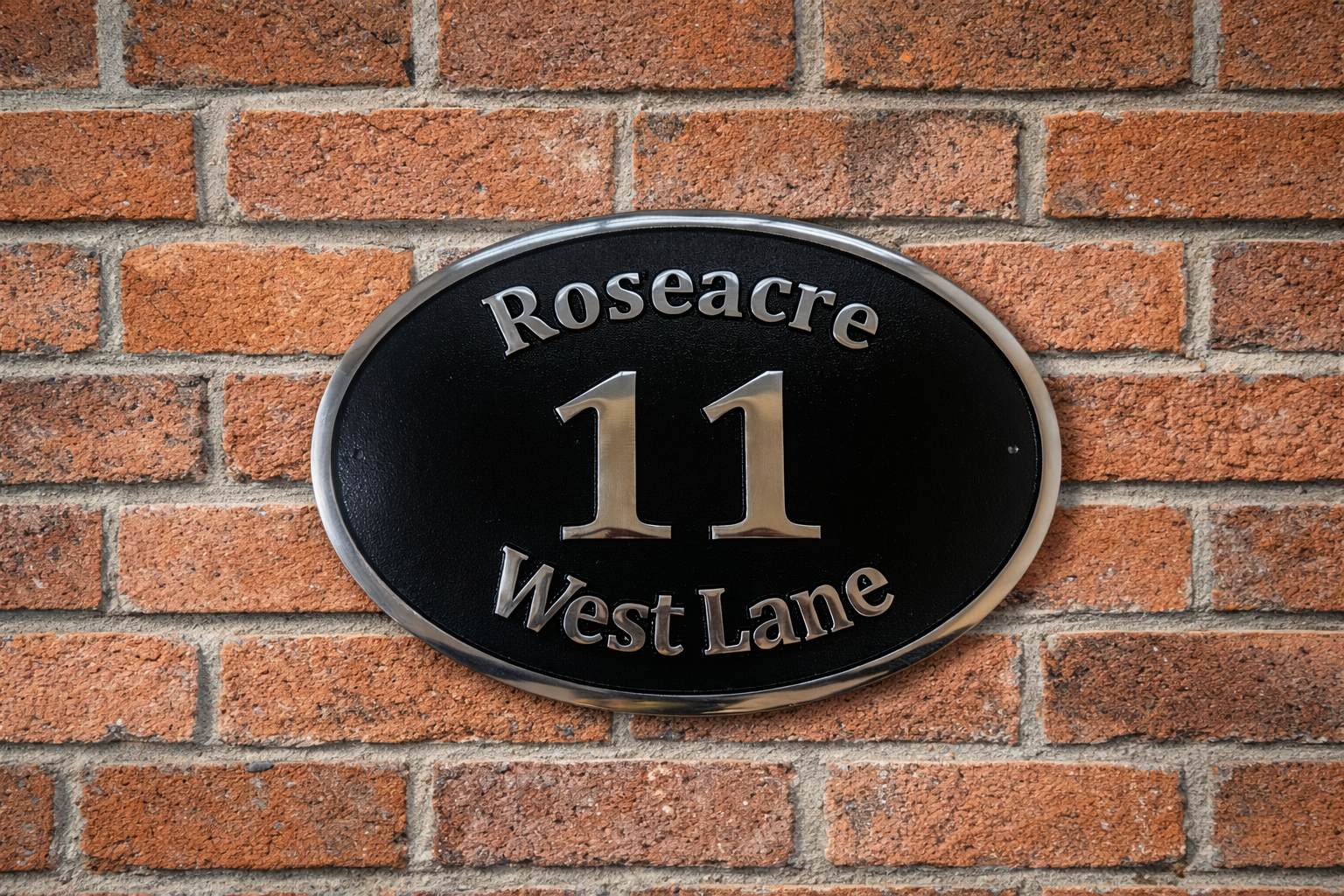 Cast aluminium oval house sign with custom name and number - black